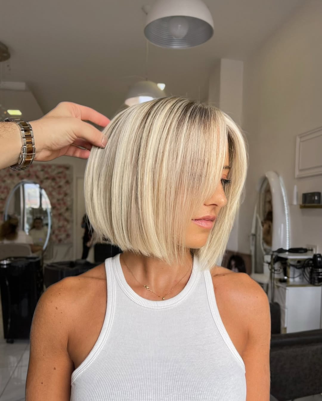 Blonde French Bob With Wispy Face-Framing Bangs