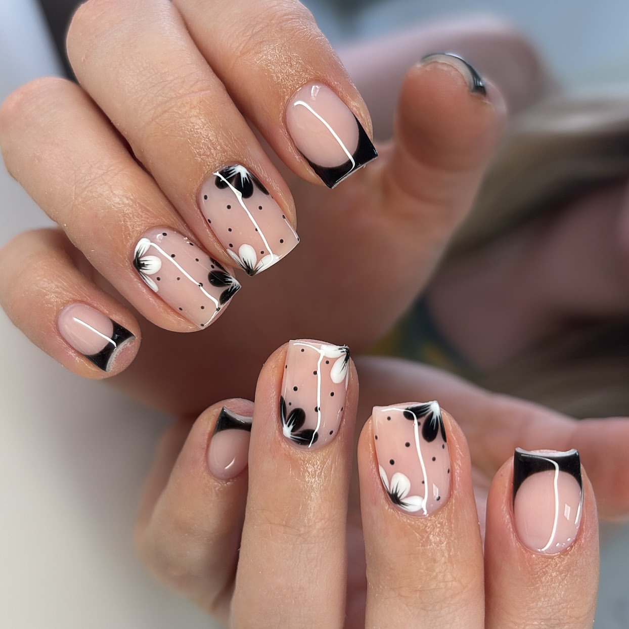 Chic Black and White Floral French Nails