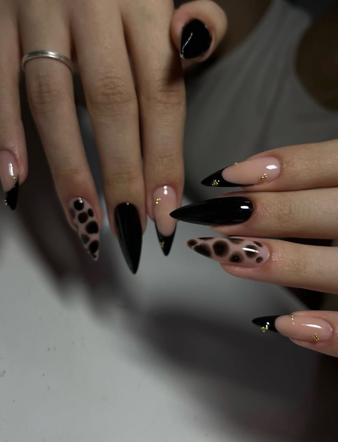 Chic Black Cheetah French Tip Stiletto Nails