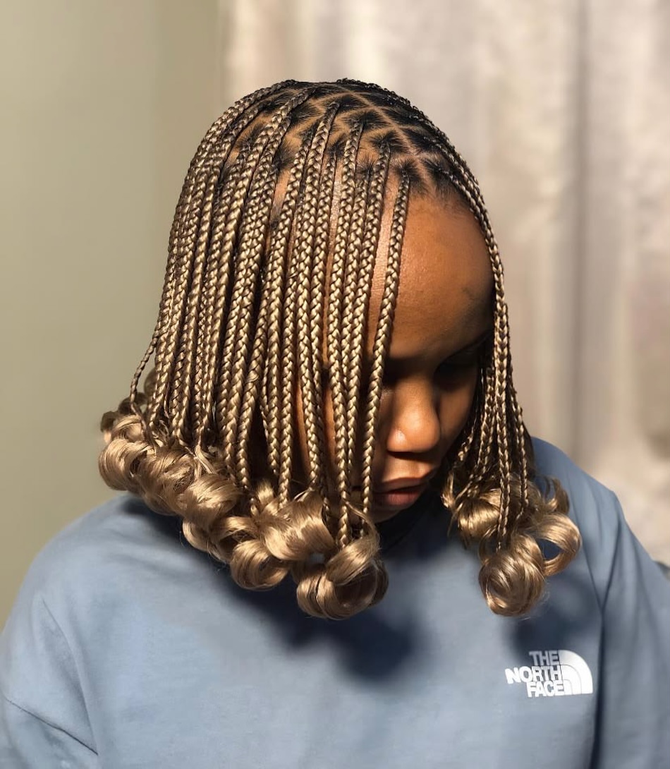 Chic Shoulder-Length Box Braids With Defined Curls