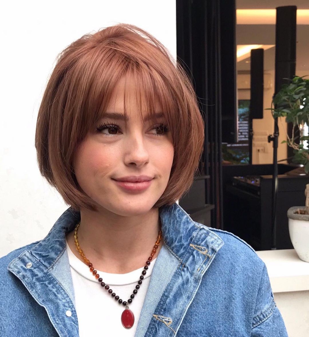 Classic Bob With Copper Hue And Wispy Bangs