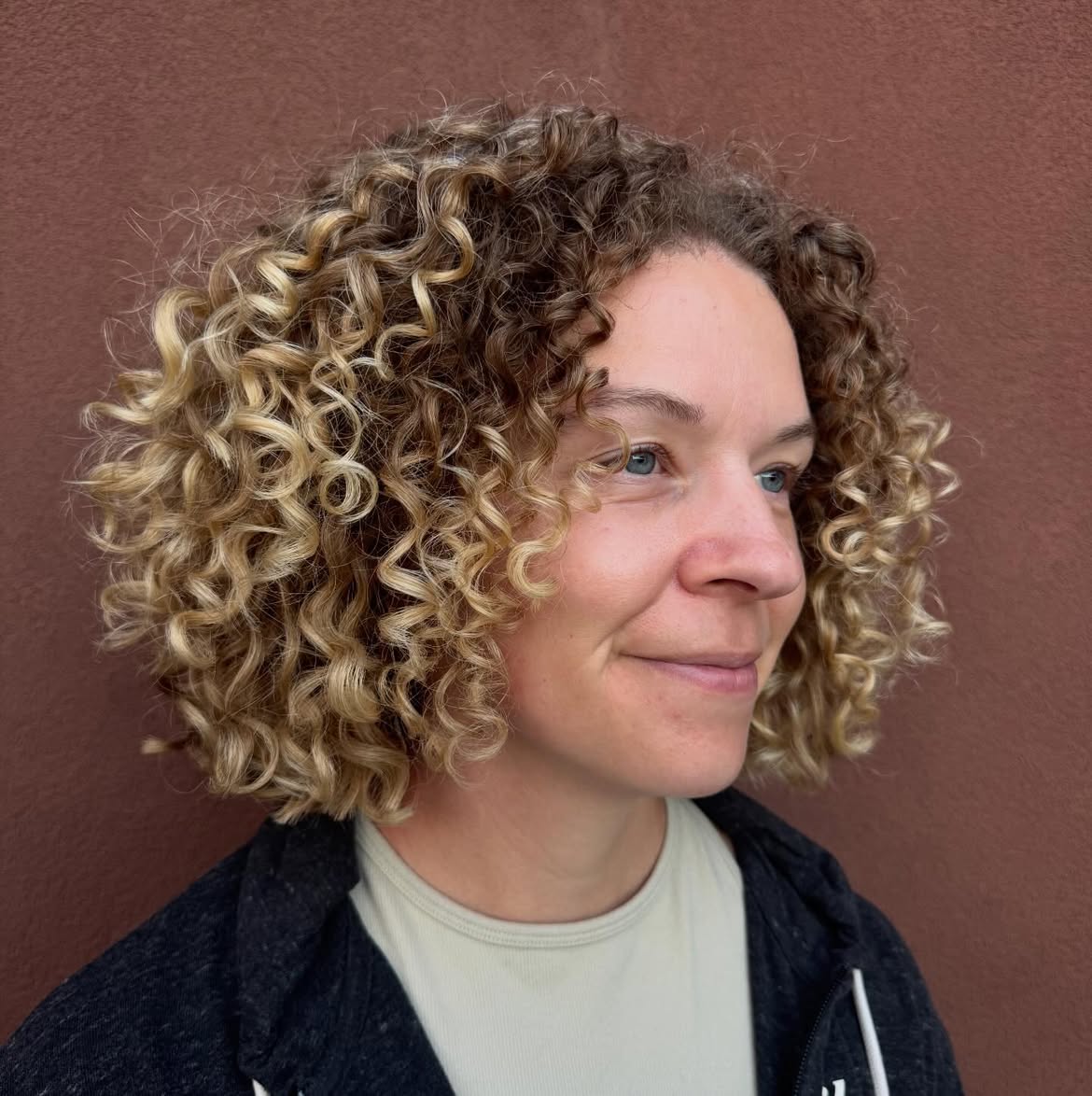 Dimensional Blonde Curly Bob With Rounded Shape