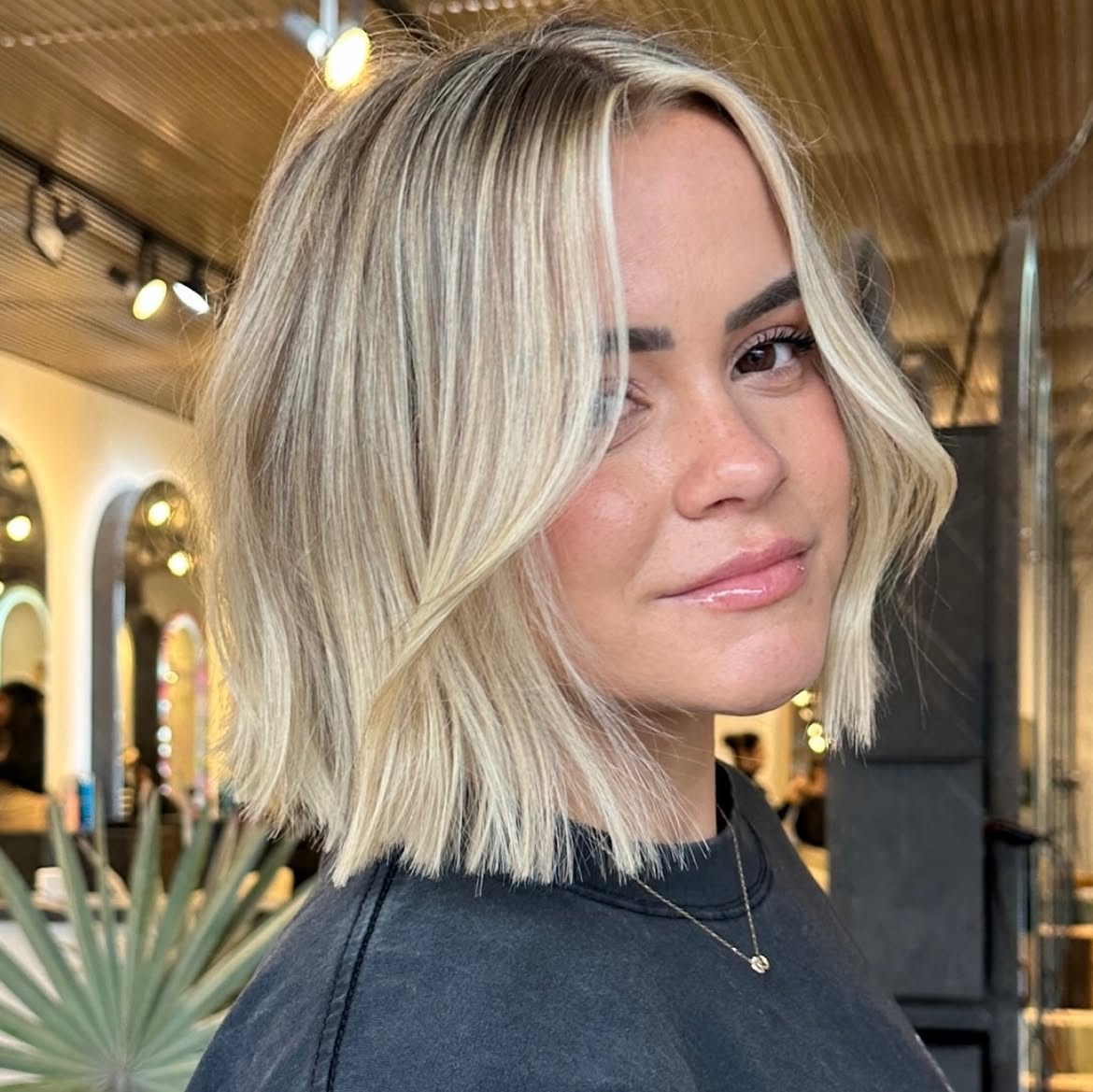 Face-Framing Layered Bob With Honey Blonde Highlights