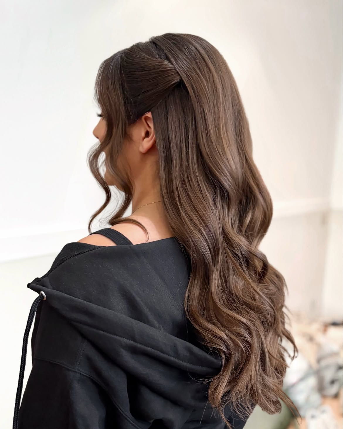Half Up Twisted Style On Long Brunette Waves