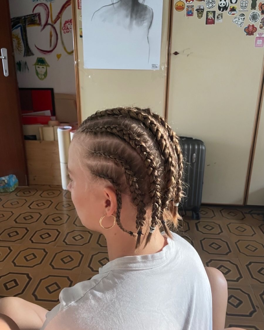Neat Cornrow Braids With Natural Auburn Highlights