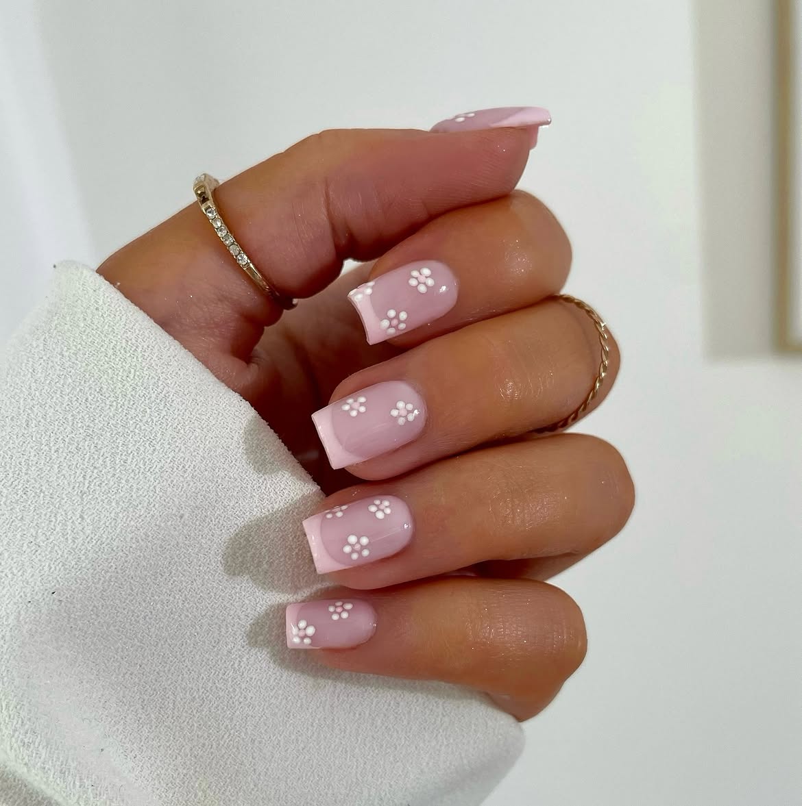Pink French Tips With White Flower Accents