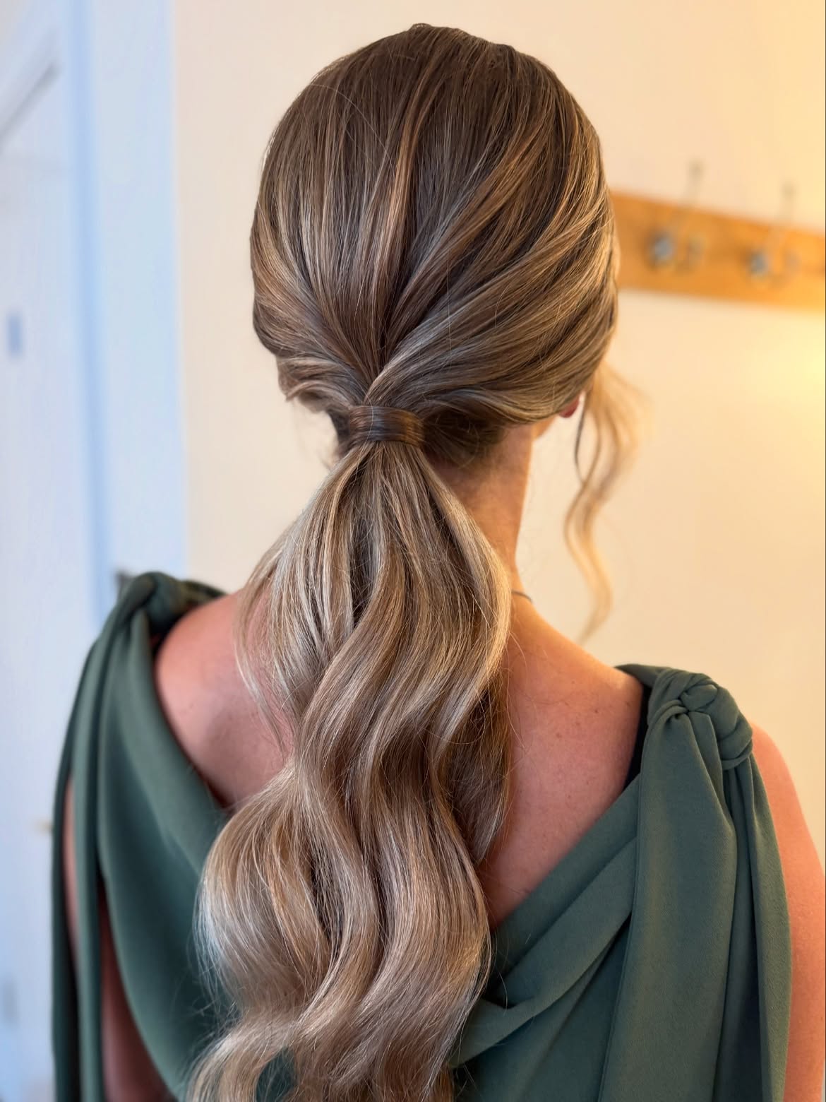 Polished Low Ponytail With Soft Wavy Texture