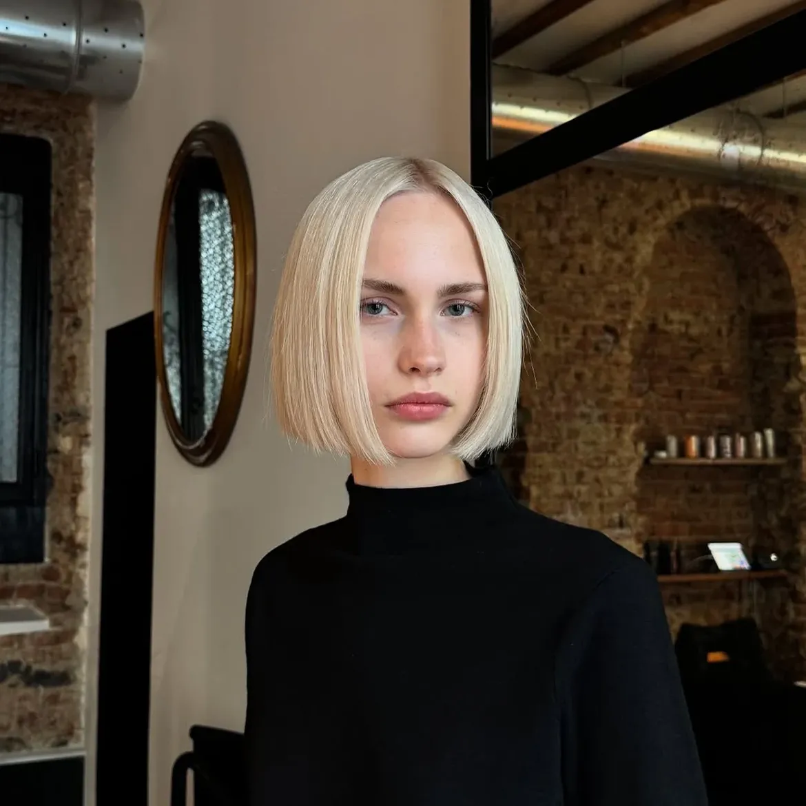 Sleek Platinum Blonde Blunt Bob With Face Framing