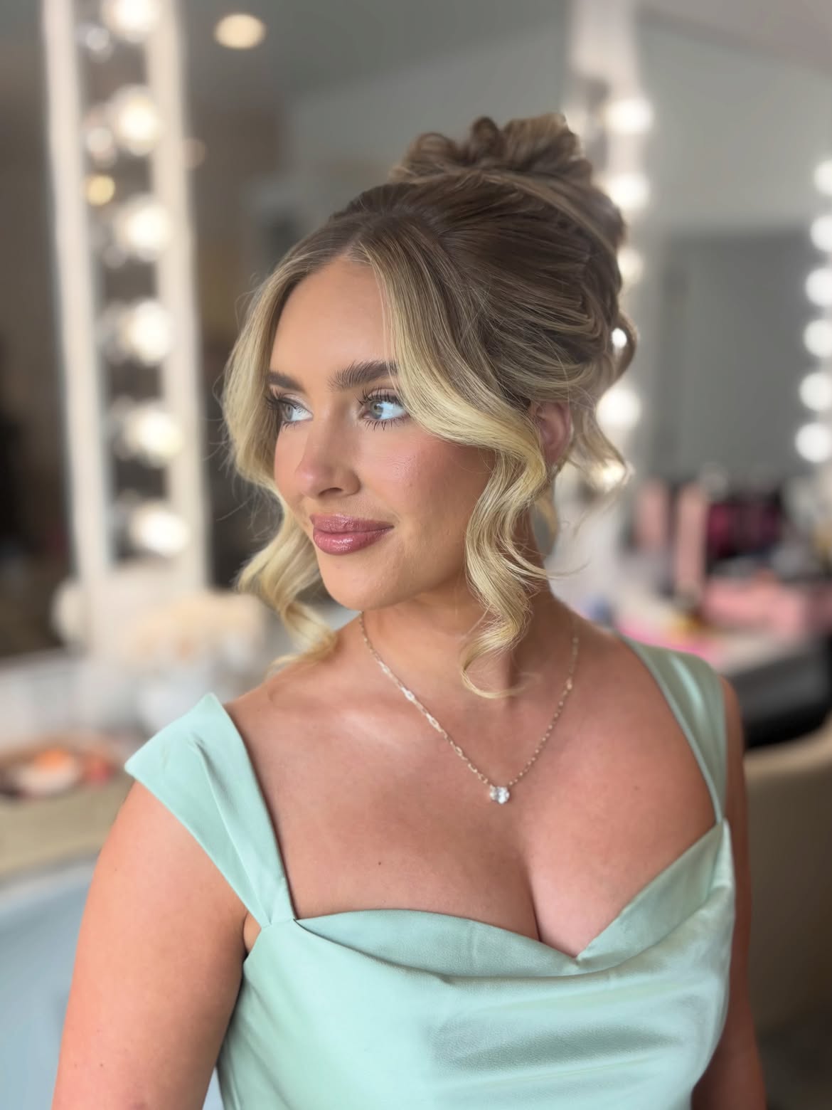 Soft Romantic Updo With Face Framing Waves
