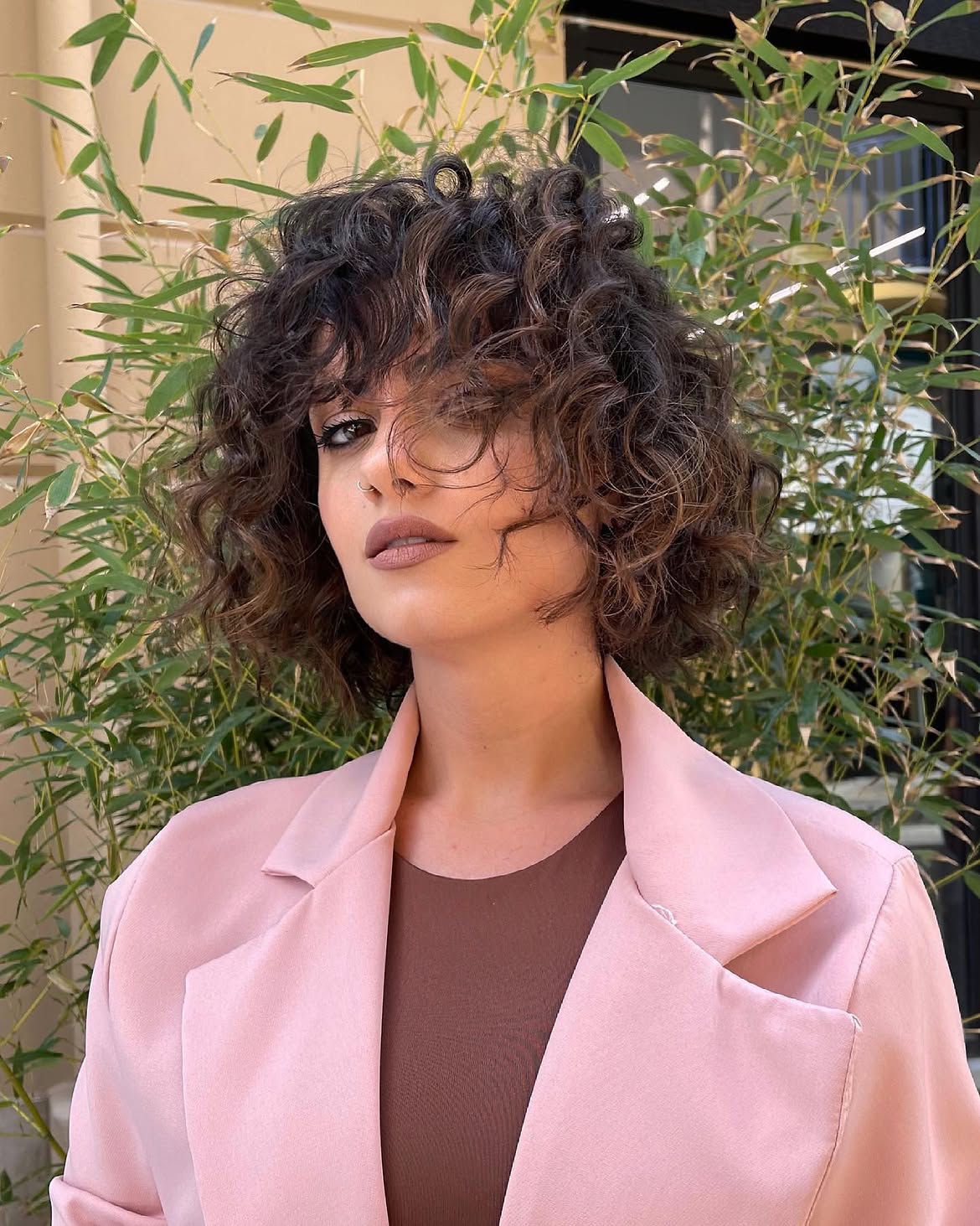 Textured Curly Bob With Soft Face Framing Layers
