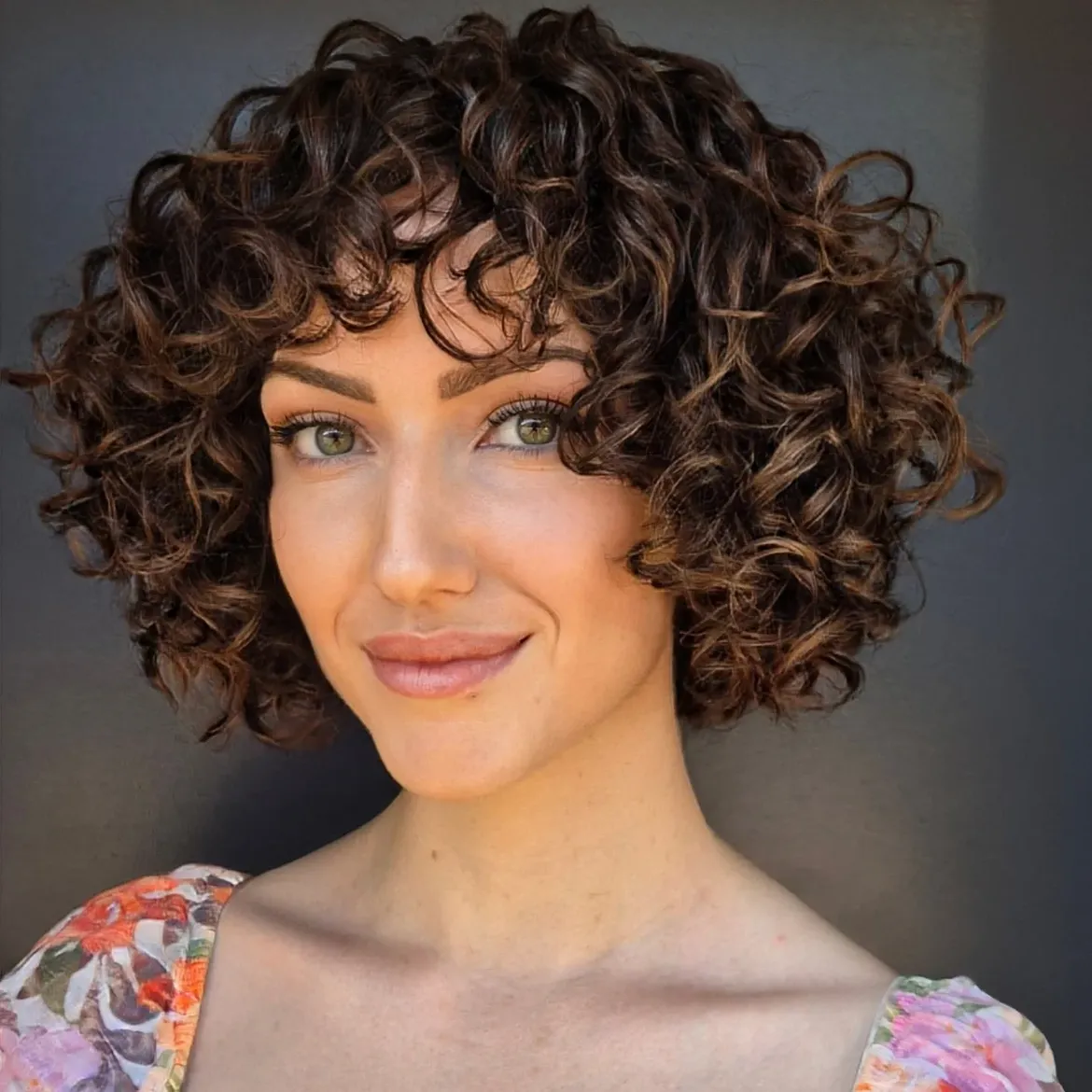 Textured Curly Bob With Soft Face Framing Layers