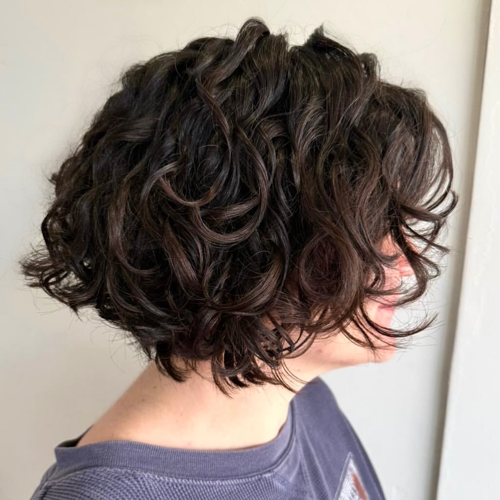 Textured Curly Bob With Soft Face Framing Layers