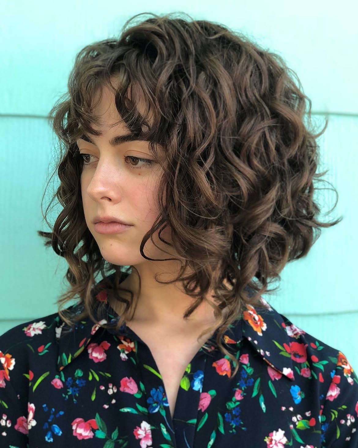 Textured Curly Bob With Wispy Curly Bangs