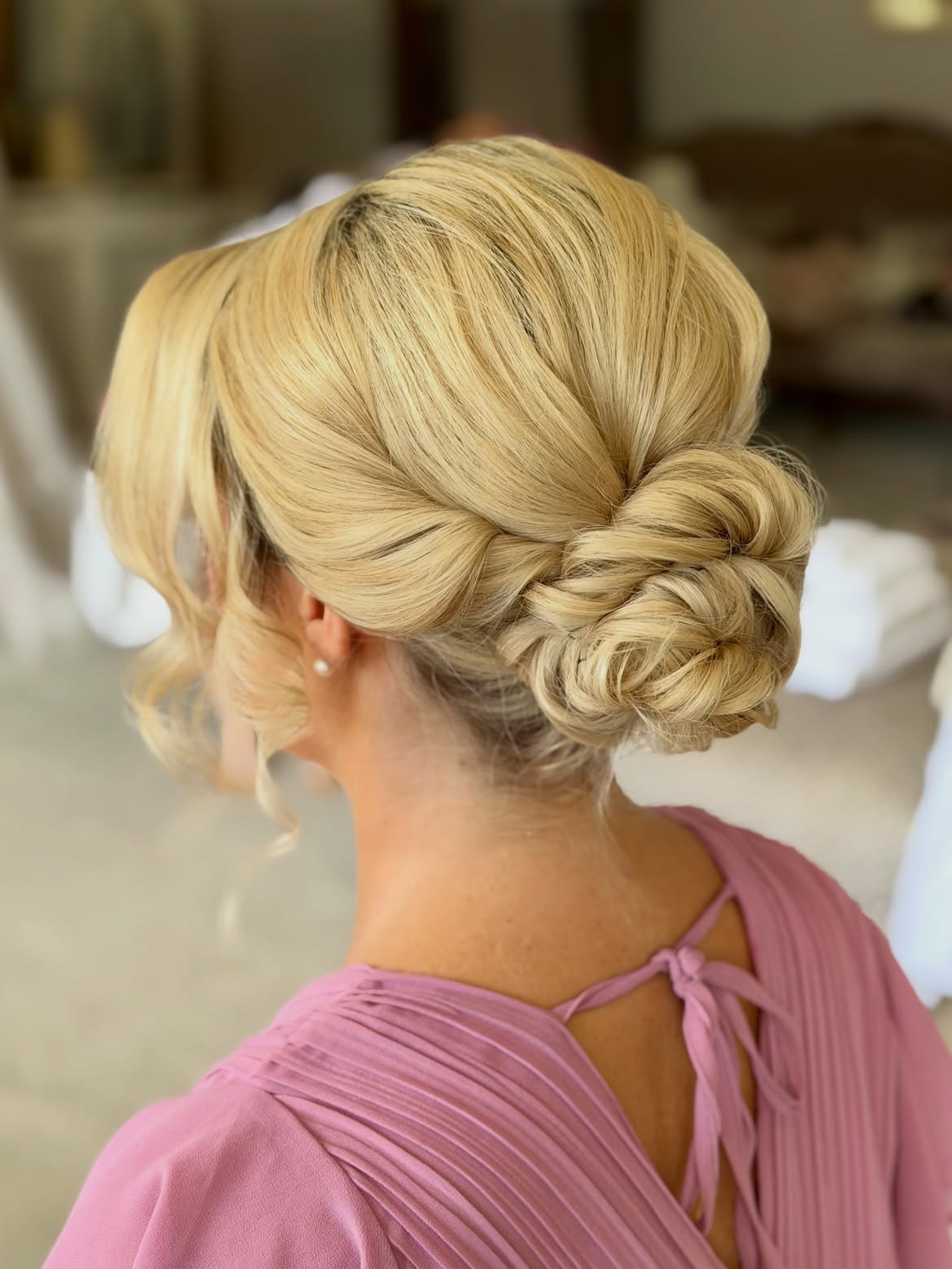 Textured Low Chignon With Face Framing Strands