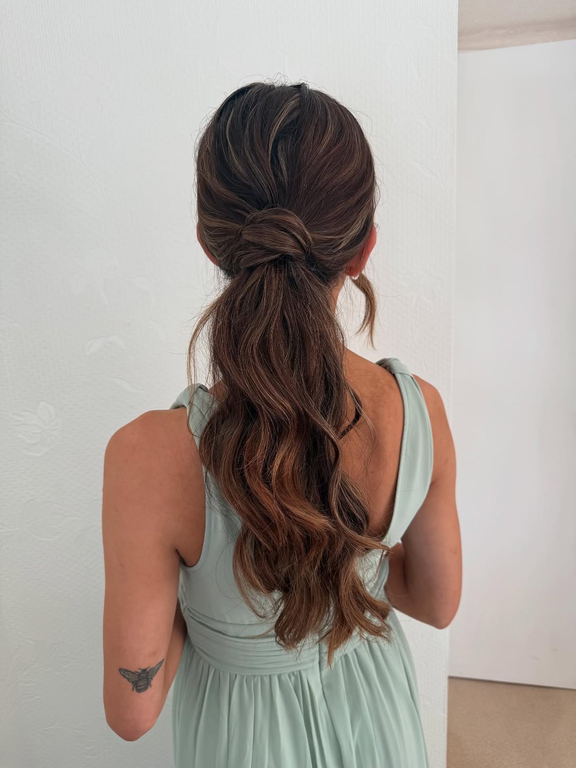 Textured Low Ponytail With Wrapped Base