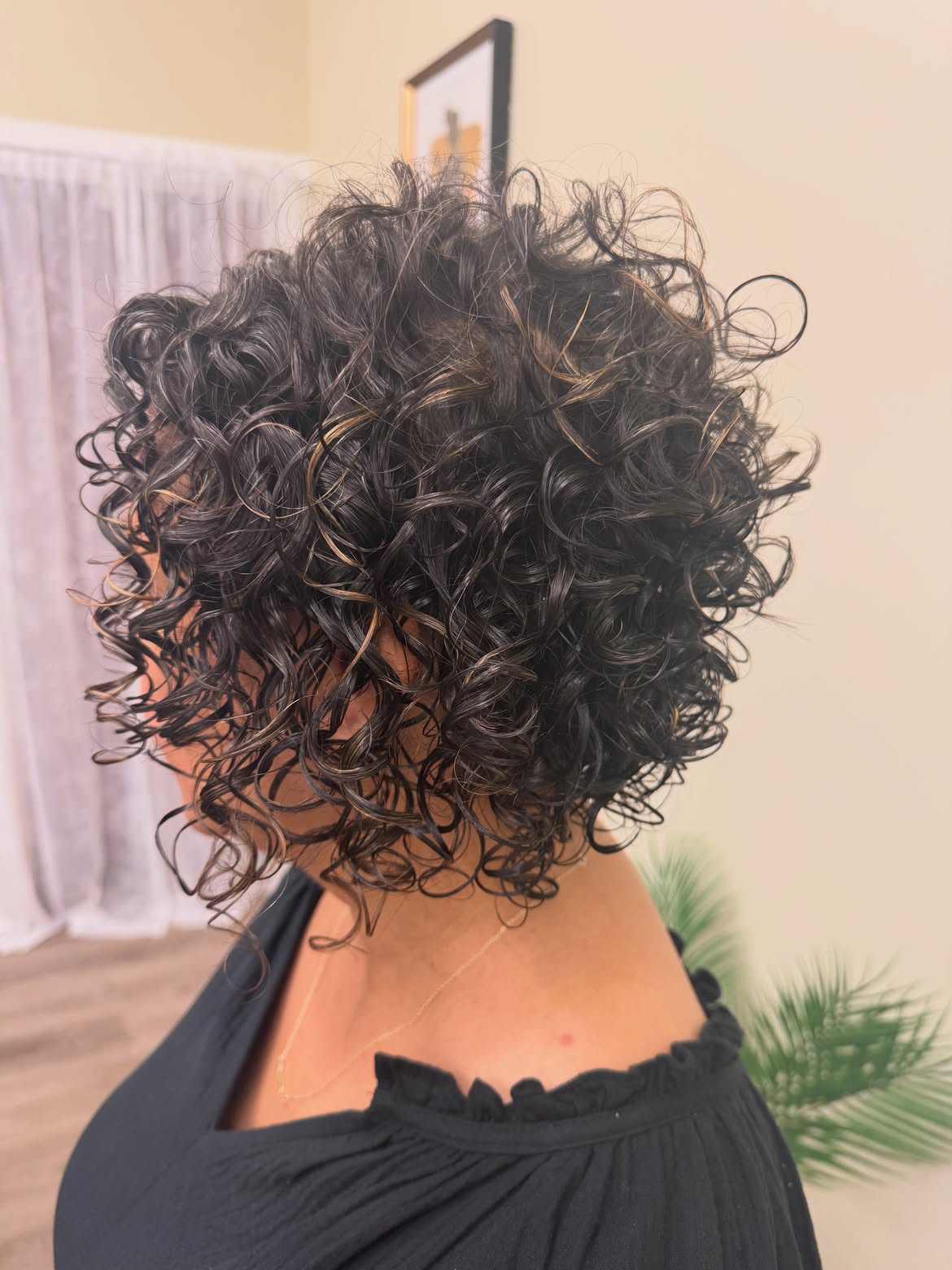 Voluminous Curly Bob With Subtle Caramel Highlights