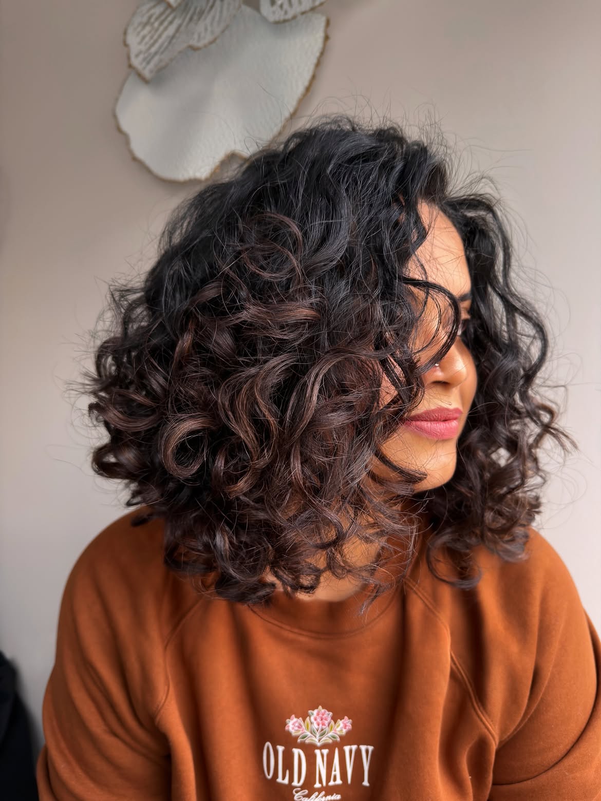 Voluminous Curly Bob With Warm Mocha Highlights